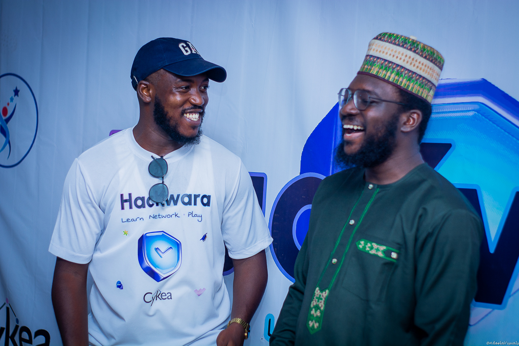 Attendees laughing at HackWara 1.0
